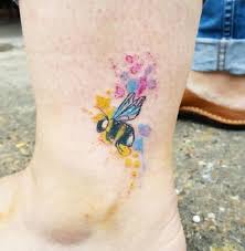 In this post you can see different images and photos of small bumblebee wrist tattoo made by different people of different ages. Cute Bee Tattoo Designs