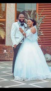 Pin By Thrivelogue On Flamboyant Wedding With Thrivelogue Couple Wedding Dress Wedding Dresses Wedding Guest Men
