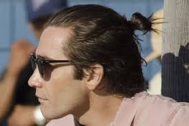 This teensy tiny half bun is absolutely adorable. Cool Girl And Guy Half Bun