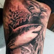 A shark appears in an upright position, with evidently great attention to detail given to its snout, eye, nostrils and gill slits. 90 Shark Tattoo Designs For Men Underwater Food Chain