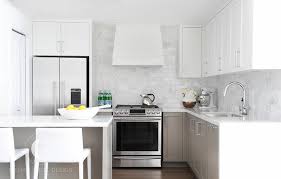 small kitchen with white upper cabinets