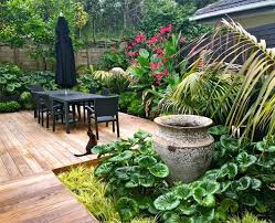 Ks Landscapes Subtropical Oasis Love The Setup And How The Plants Are Planted Around The Garden Landscape Design Small Tropical Gardens Tropical Garden Design