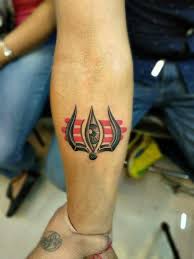 The chequered look at the base of the hand and the way the car is sketched lends a stupendous appearance to the entire concept. Romit Tattoo Planet Akharaghat Tattoo Artists In Muzaffarpur Justdial