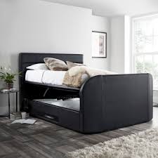 Emma queen bed set includes queen headboard, footboard and set of side rails and slats; Annecy Black Leather Ottoman Media Tv Bed