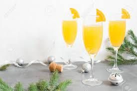 Just add orange juice to a champagne flute and top off with champagne. Mimosa Festive Drink For Christmas Champagne Cocktail Mimosa Stock Photo Picture And Royalty Free Image Image 89145800