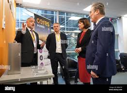 Leader of the Labour Party Sir Keir Starmer and shadow chancellor Rachel  Reeves are shown a Hydrogen Fuel cell stack by CEO Phil Caldwell and  Production Manager Steve Brown (left) during their