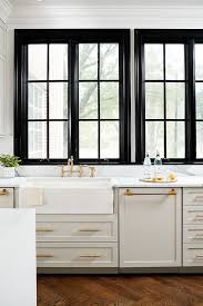 If possible, remove the hardware from the cabinets and drawers before cleaning. Light Gray Shaker Cabinets With Hidden Dual Dishwashers Transitional Kitchen