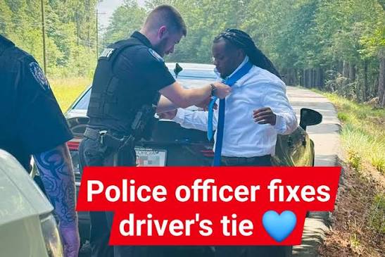 Officer pulled over a man for speeding but after realizing he was late to a funeral  he helped him tie his tie & offered some compassion