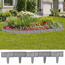 Lawn edging comes in a variety of materials like natural stone, including fieldstone and flagstone. Bluecc Landscape Edging 41 Pcs Plastic Stone Look Garden Lawn Edging And Landscape Border Buy Online In Cayman Islands At Cayman Desertcart Com Productid 135932986