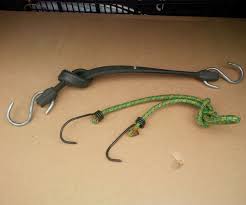 String unlocking hack · string it through. Bungee Rope Vs New Car Where To Tie Them In The Trunk 4 Steps Instructables