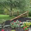 The primitive design of a split rail fence can give your home and yard a more rustic look, which is gaining in popularity. 1