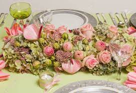 Whether looking for a floral arrangement of roses or mixed flowers, find something perfect! Beautiful Twotone Flower Arrangement In Soft Pink And Green On A Christmas Dinner Table Stock Photo Picture And Royalty Free Image Image 32718199