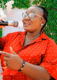 Wonderful Ms. Judith Neal with family photos of her daughters, son,  son-in-law and grandson —Winnsboro 👍🏽