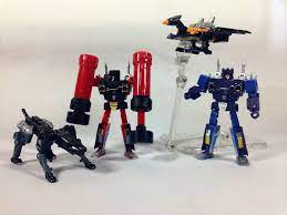 MP-1516 Rumble, Frenzy, Ravage and Buzzsaw – Pax Cybertron