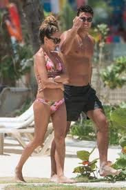 Megan mckenna is currently recording an album after winning the x factor: Megan Mckenna Wears A Floral Print Bikini At Beach With On Holiday With Her New Boyfriend Mike Thalassitis In Barbados 210318 4