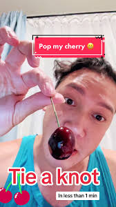 Nanny Tying A Cherry Knot with Yarn