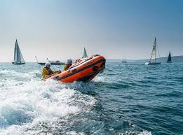 The royal national lifeboat institution (rnli) is the charity that saves lives at sea. Rnli Lifeboat