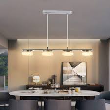 The industrial fixture includes a transparent glass shade and sports plated metal hardware with a contrasting bronze finish. Depuley Led 4 Lights Pendant Light Modern Kitchen Island Lighting Fixture Adjustable Height Ceiling Mount Hanging Pendant Light For Contemporary Mid Century Dining Room Bar 20w 3000k Warm Light Buy Online In Brunei At Brunei Desertcart Com
