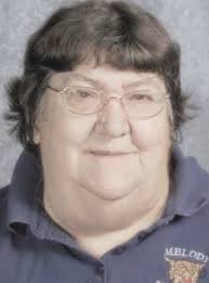 Teacher's aide dies in collision with semi