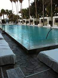 Delano Miami One Of My Favorite Hotels Clean Lines Set The Standard For Contemporary Design In Miami Beautiful Places To Travel Resort Pools Great Hotel