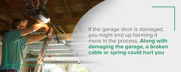 Turn the key and pull the lock tumbler out of the lock to engage the release mechanism on the garage door opener carriage. How To Open A Garage Door Without Power Olympic Garage Door