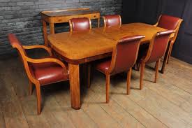 Our restored art deco sofas and art deco chairs are fully reupholstered with hand tied springs, impeccable detail and comfort. English Art Deco Dining Table Chairs Set 1930s Set Of 7 For Sale At Pamono