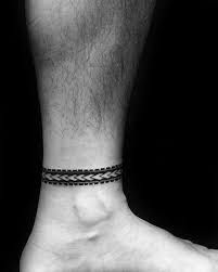 Check the latest armband tattoos for men. Whats So Trendy About Ankle Band Tribal Tattoos That Everyone Went Crazy Over It Ankle Band Tribal Ankle Tattoo Men Ankle Bracelet Tattoo Wrist Band Tattoo