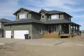 Front door colors for a white house. Olive W Dark Grey Shutters Red Door Green Stucco House Stucco Homes Green House Exterior