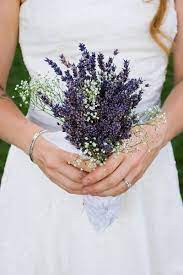 Get ready for some drop dead gorgeous wedding bouquet ideas from our favorite floral designers. Christine And Ben S Wedding In Omaha Nebraska Purple Bridal Bouquet Wedding Bridal Bouquet
