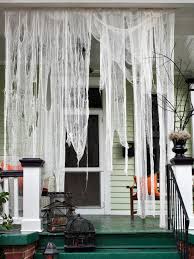 Shop sweet halloween kitchen décor and tabletop figures that pile on the charm. Make Ghostly Outdoor Draperies For Halloween Hgtv