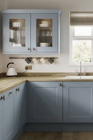 White worktops white is often the foundation to a bright and inviting space, so white worktops offer a great way of introducing this popular colour to a room. Chelford Paintable Blue Kitchen Light Blue Kitchens Kitchen Cupboards Paint Kitchen Cupboard Colours