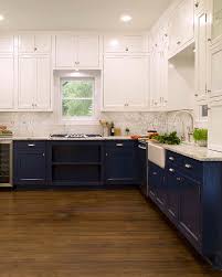 Unfinished, painted, and stained wood all work well, as does mdf, compressed/faux wood. White Upper And Dark Blue Lower Cabinets In A Fantastic Kitchen Transitional Kitchen Other By Paper Moon Painting Houzz