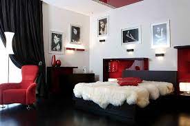 A matte black kitchen makes a bold statement in this via www.homestolove.co.nz. Bold Black And White Bedrooms With Bright Pops Of Color