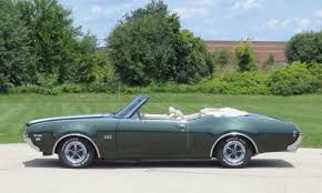 Image result for Scaraba Green 1930 Oldsmobile