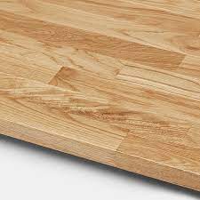Our full stave american walnut worktops were used to create a dining table right in the heart of this modern kitchen. Goodhome 26mm Kava Natural Solid Oak Square Edge Kitchen Worktop L 3000mm Diy At B Q