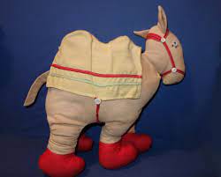 Faithfully based on the original gruelle images, the camel with the wrinkled knees™ stands approximately 14 tall and is designed in scale to the… Pin On Dolls Cloth Wood Old New