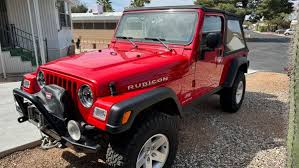 Image result for Flame Red 2005 Jeep