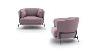 Relax on a small armchair and enjoy a cosy blissful day! Arflex Cradle Armchair Sofa Small Table Design Neri Hu Arflex