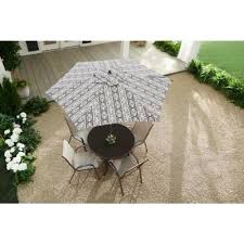 Beat the heat and stay cool under the sun with our affordable selection of colorful and stylish outdoor umbrellas, canopies and umbrella stands. Hampton Bay Weather Resistant Patio Umbrellas Patio Furniture The Home Depot