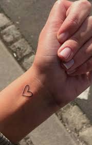 Simple Minimalistic Black Heart Tattoo Red Heart Tattoos Heart Tattoo Wrist Heart Tattoo Designs