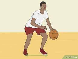 How to dribble a basketball. How To Dribble A Basketball Between The Legs With Pictures