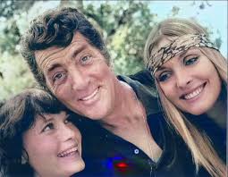 SHARON TATE, MIA FARROW, and DEAN MARTIN photographed at Joshua Tree  National Park, 1968. “There was the perfection of her face, of course. And  a radiance more usually found in children. There