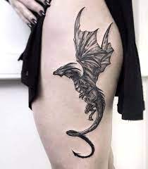 So if you're considering a. Game Of Thrones Dragon Viserion Thigh Tattoo Woman Wearing Black Dress Japanese Dragon Tattoo Dragon Thigh Tattoo Tattoos Dragon Tattoo Designs