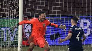 Mr david marshall, chief mister of singapore, entering conference hall and sitting down at table. Scotland Qualify For Euro 2020 David Marshall S Reaction To Penalty Save Will Become Iconic Football News Sky Sports
