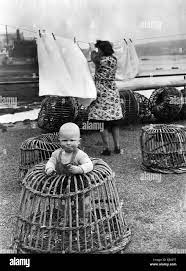At 14 Months Baby David Is Just Lobster Pot Size And That Is Just Where Mum Puts Him April 1949 Stock Photo Alamy