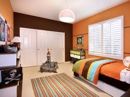 Sliding doors along particular sections of your closet and bright, recessed lighting can help with pulling this look together. Orange Bedrooms Pictures Options Ideas Hgtv