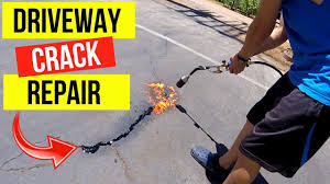 It can be compressed by hand to create a permanent repair. Best Way To Fix Cracks In Asphalt Driveway Jonny Diy Youtube