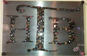 Crafty Bottle Cap Art By Amanda Wilshire Of Awd Art As Seen Atthe Highland Tap And Burger Bottle Cap Art Bottle Cap Table Bottle Cap