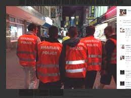 Dressed in bright orange reflective vests with shariah police printed on the back. Freispruch Fur Islamisten Der Scharia Polizei Von Wuppertal