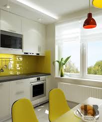 To give a strong character to the white kitchen, installing patterned tiles like these work well. White Kitchen With Yellow Accents Interior Design Ideas